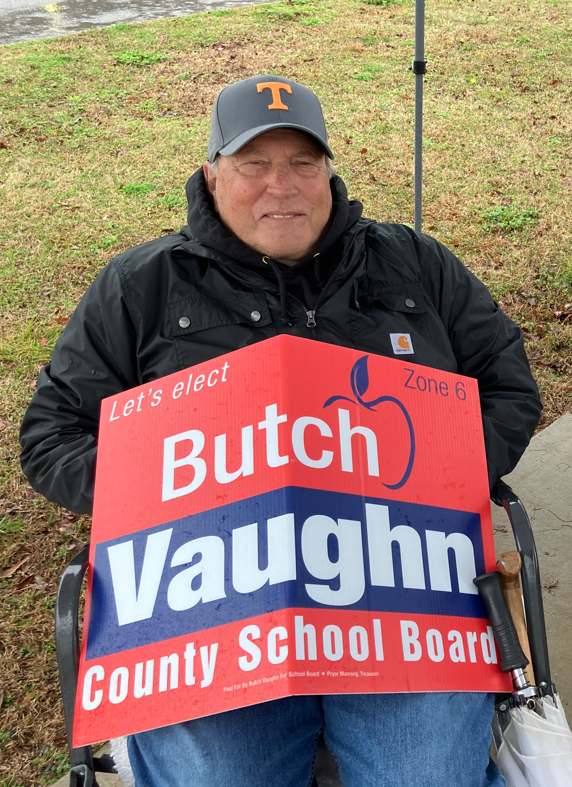 Butch Vaughn campaigns Tuesday for a Rutherford County Board of Education seat outside the SportsCom polling place.