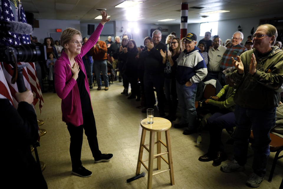 Democratic presidential candidate Sen. Elizabeth Warren, D-Mass., waves to audience members at the end of a town hall meeting, Monday, Dec. 16, 2019, in Keokuk, Iowa. (AP Photo/Charlie Neibergall)