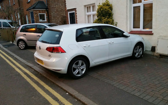 Niall McCarthy's car parked on his drive - where he received a parking ticket. See MASONS story MNTICKET: A man was shocked to return home from work to find traffic wardens had slapped a parking ticket on his car - despite it being parked on his drive. Niall McCarthy, 49, has been using his tiny driveway since 2002 and hasn't had any problems with parking fines before. He has even propped a piece of wood in front of his house which allows the family to drive within a centimetre of their wall without hitting the building. He said: "It is just laughable really. The car was as tight to the house as we can get it.