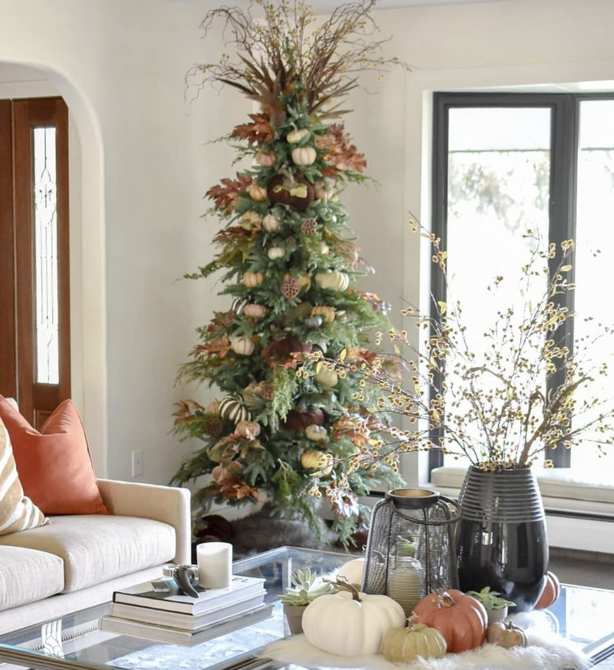 a tree with decorations on a table