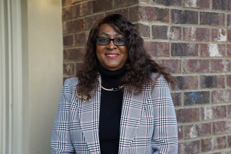 Supporter of former U.S., President Donald Trump, Camille Moore, poses for a portrait in Atlanta