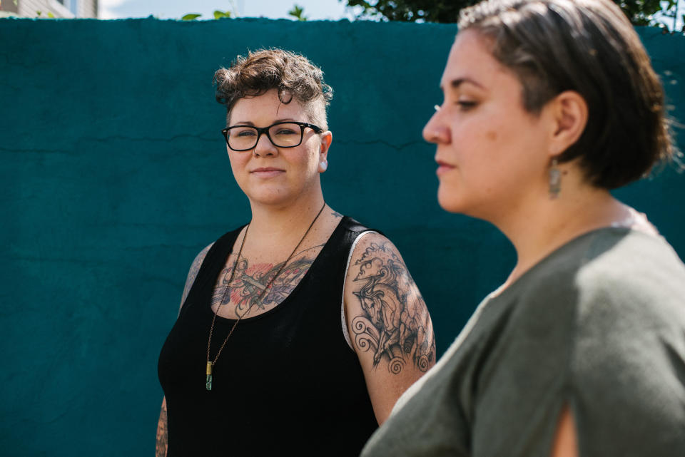 Dese'Rae Stage (left) and Felicidad Garcia, who both struggled with infertility, pose at their Philadelphia home on June 20, 2019. (Photo: Hannah Yoon for HuffPost)