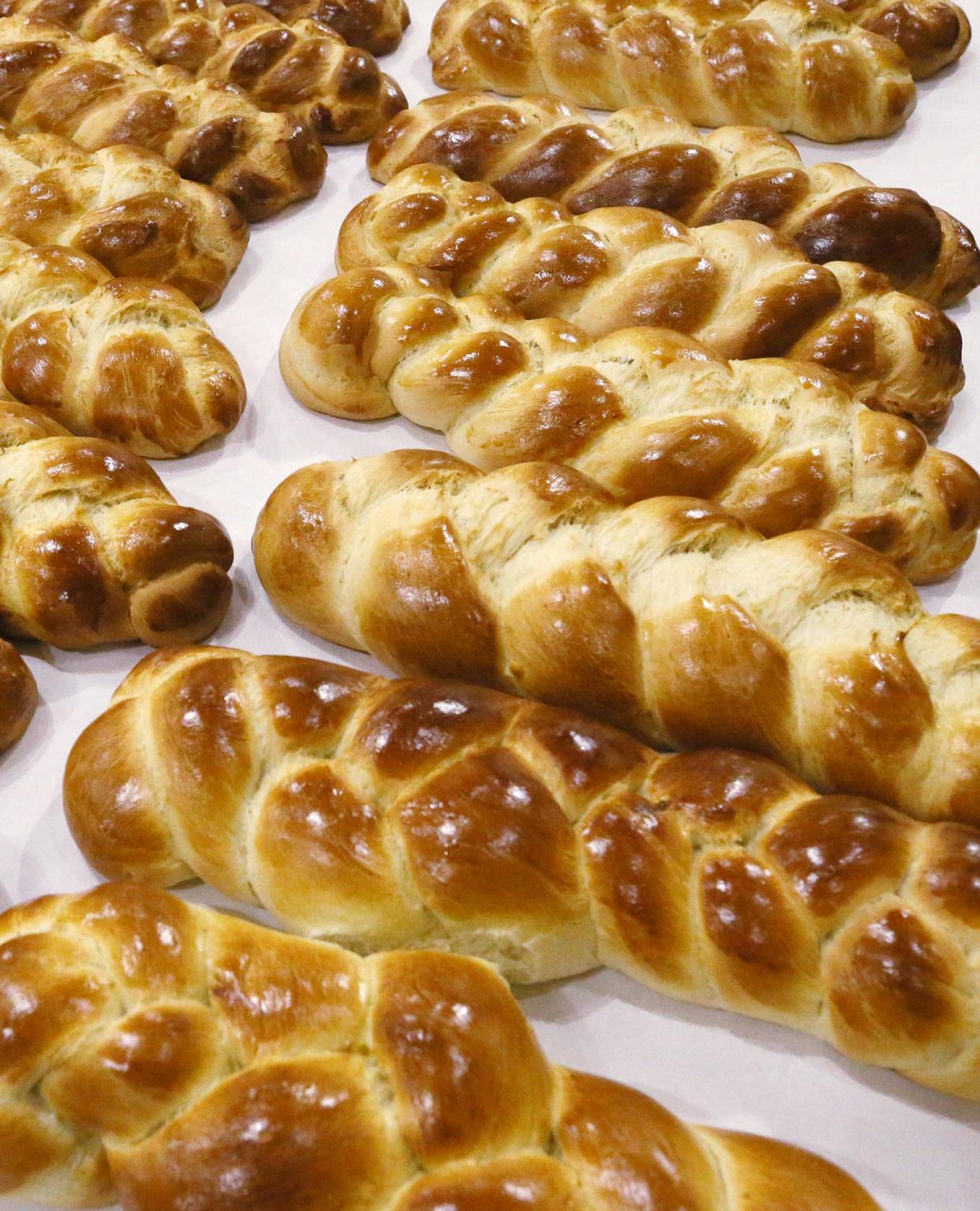 Volunteers from Annunciation's Philoptochos Society of Akron and Kalymnian Society of Campbell, Ohio, baked 400 loaves of tsourekia, a braided sweet Easter bread, Tuesday for Annunciation's Easter Bake Sale March 27 and 28.