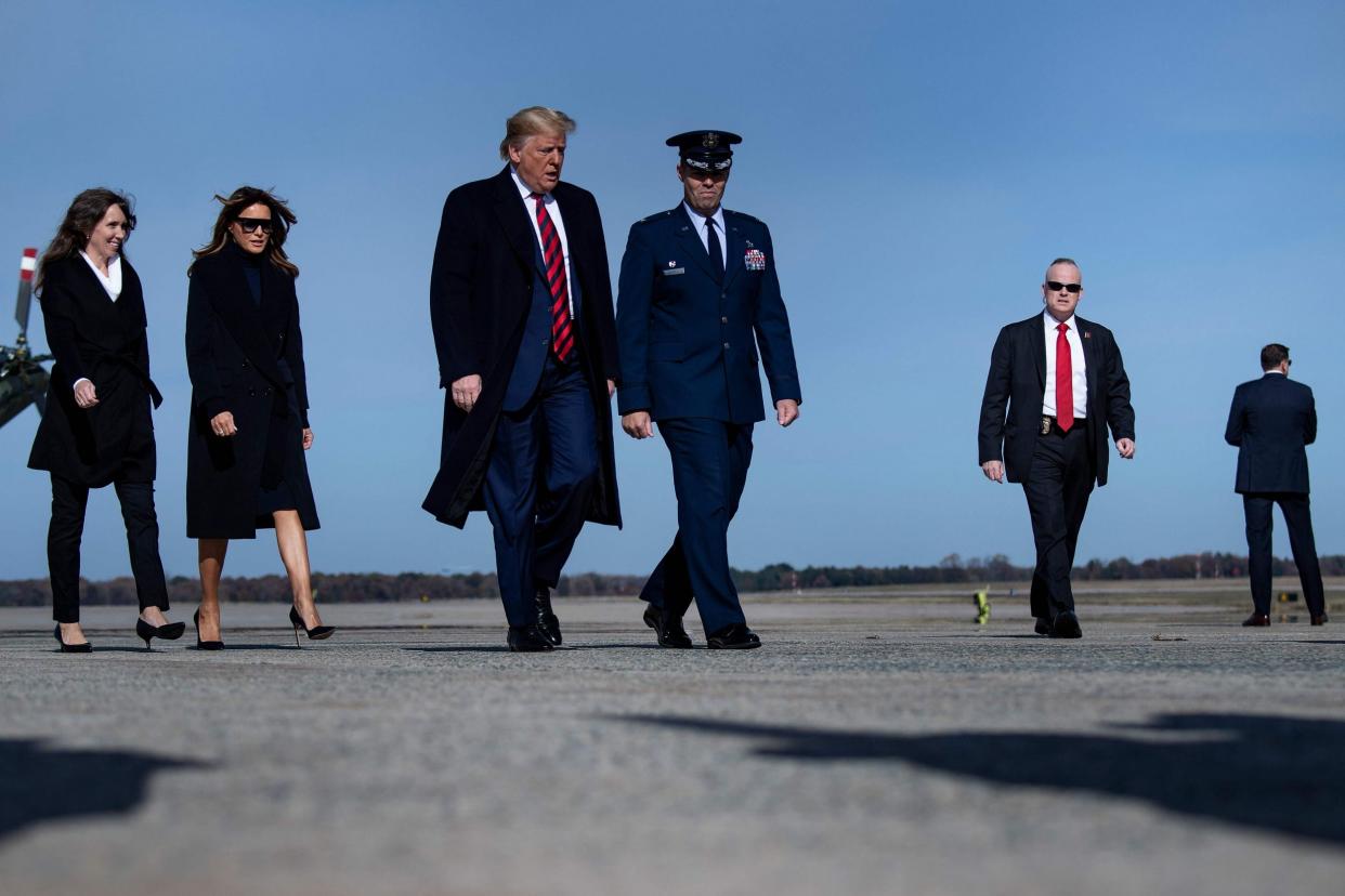 President Donald Trump and first lady Melania Trump at Andrews Air Force base in Maryland: AFP via Getty Images