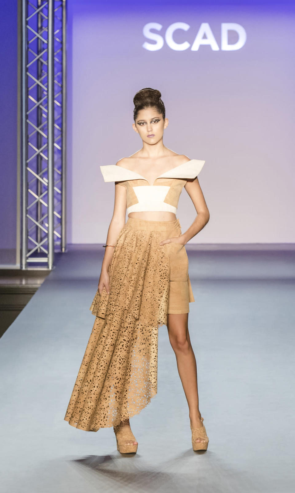 SCAD graduate Alessandra Jourdan made her designs entirely of thinly-shaved cork — who knew it made such beautiful material for an evening gown?