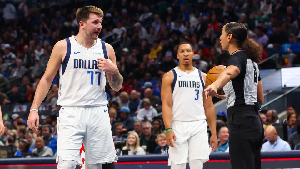 Moyer-Gleich, pictured here speaking to Dallas Mavericks superstar Luka Dončić, has built up six seasons of refereeing experience in the league. - Kevin Jairaj/USA TODAY Sports/Reuters