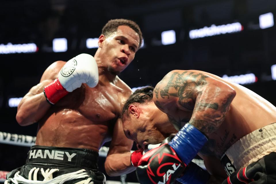 Haney (left) eased past Regis Prograis to become a two-weight world champion (Getty Images)