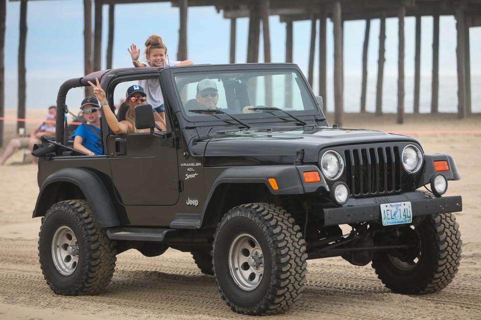 Jeeps parade across the Beach during Ocean City Jeep Week on August 23, 2019.