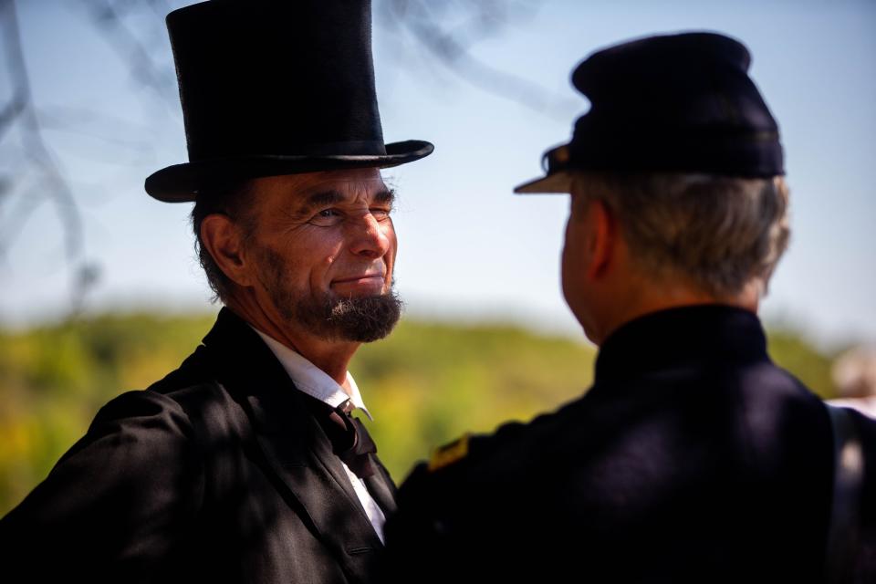 Fritz Klein portrays President Abraham Lincoln during the 12th Annual Civil War Muster Saturday, Sept. 18, 2021 at Van Raalte Farm Park in Holland.