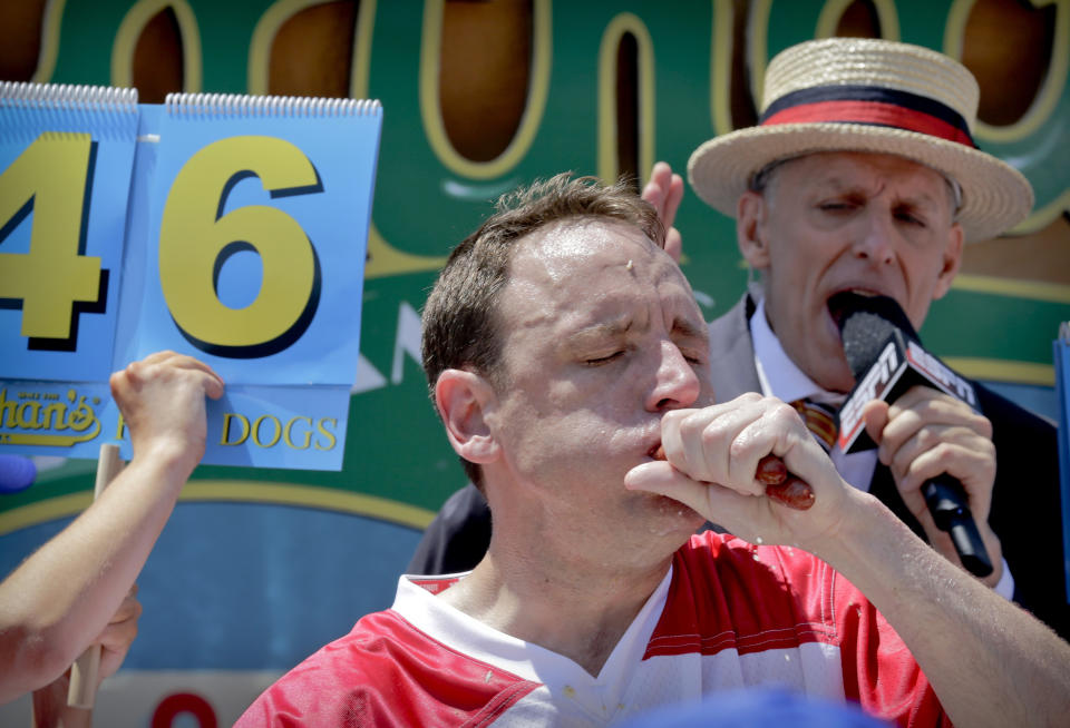 Joey Chestnut eats two hot dogs at a time during the Nathan's Hot Dog Eating Contest on July 4, 2017, in New York.