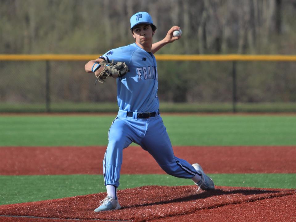 Franklin's Austin Campbell tosses a pitch during a Hockomock League game against Taunton