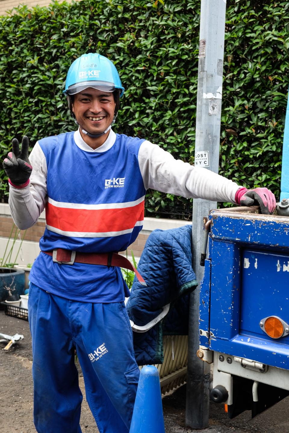 “This guy is a construction worker on the street in Tokyo in probably the coolest outfit I've seen in my life. The fit of the shirt, the athletic stripes, the logo placements on the shirt and pants, the fit of the pants with double pleats and cargo pocket—and don't get me started on the belt. Incredible.”