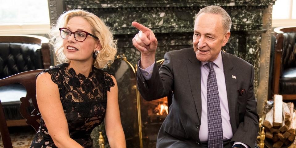 From left, Sen.-elect Rep. Kyrsten Sinema, Senate Minority Leader Chuck Schumer, D-N.Y., and Sen.-elect Rep. Jacky Rosen, D-Nev., talk during a photo-op in Schumer's office in the Capitol on Tuesday, Nov. 13, 2018.