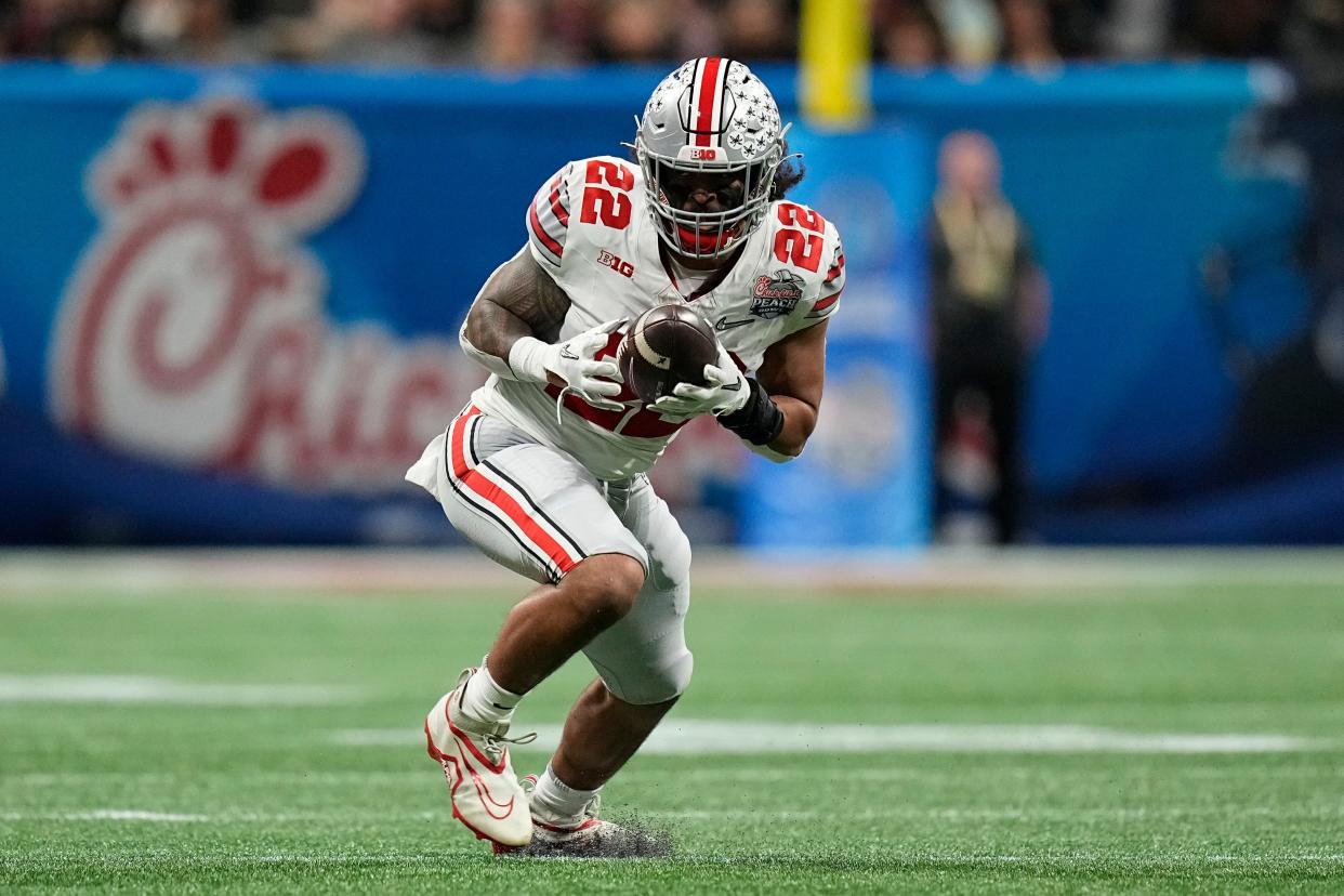 Dec 31, 2022; Atlanta, Georgia, USA; Ohio State Buckeyes linebacker Steele Chambers (22) intercepts a pass from Georgia Bulldogs quarterback Stetson Bennett during the first half of the Peach Bowl in the College Football Playoff semifinal at Mercedes-Benz Stadium. Mandatory Credit: Adam Cairns-The Columbus Dispatch