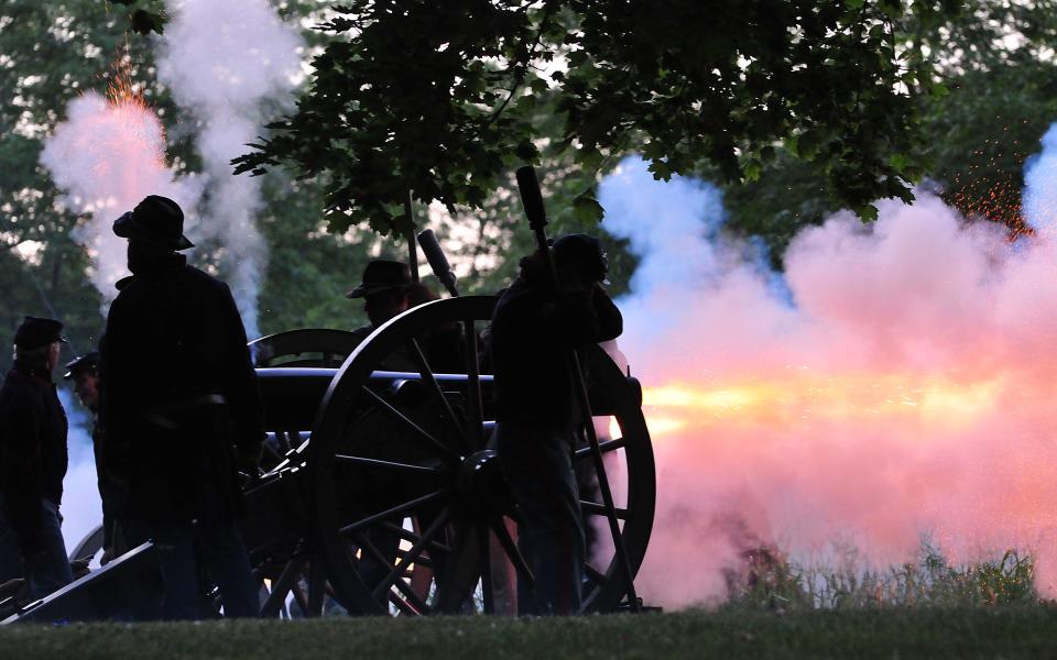 Cannons were fired by Battery D, 1st Ohio Light Artillery during the playing of “Stars and Stripes Forever,” to end the Ashland Symphony Orchestra’s annual Pops in the Park Concert Sunday, July 3, 2022 at Guy C. Myers Memorial Bandshell, with new Conductor and Music Director Michael Repper leading the orchestra. Cannons were also fired during the “1812 Overture” earlier in the program.