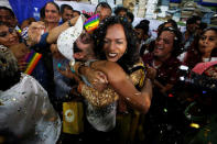 <p>Supporters of the lesbian, gay, bisexual and transgender (LGBT) community celebrate after the Supreme Court’s verdict of decriminalizing gay sex and revocation of the archaic Section 377 law, at an NGO in Mumbai, India, September 6, 2018. REUTERS/Francis Mascarenhas </p>