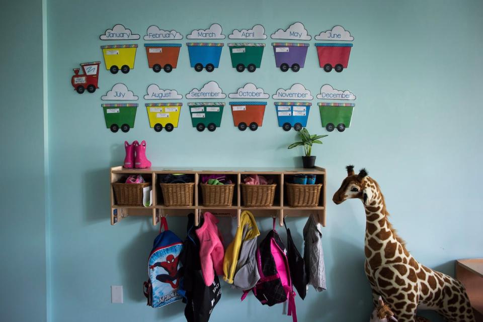 Advocates say that early childhood educators in Ontario are among the lowest paid in the country, and say that raising their wages is critical to the success of the $10-a-day child-care program. Children's backpacks and shoes are seen at a daycare franchise, in Langley, B.C., on May 29, 2018.