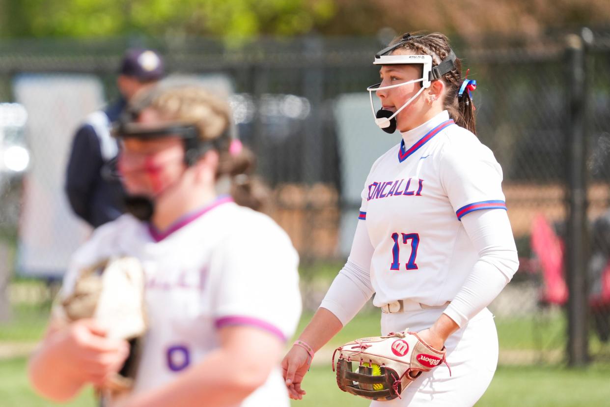 Roncalli Royals Addy Poe (17) holds the ball in her glove during the Carmel Softball Invitational on Saturday, April 20, 2024, at the Cherry Tree Softball Complex in Carmel, Indiana.