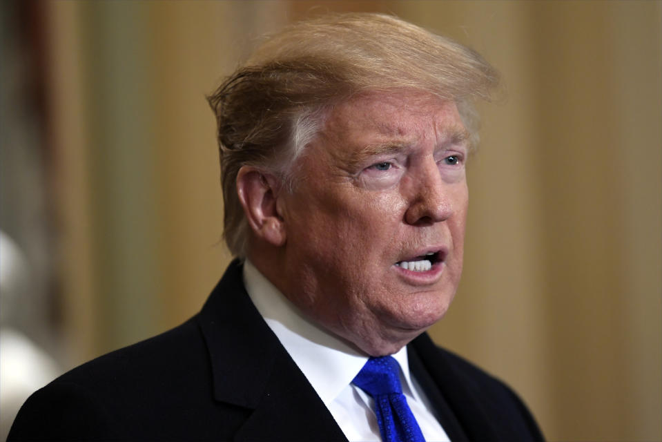 President Donald Trump speaks to members of the media as he arrives for a Senate Republican policy lunch on Capitol Hill in Washington, Tuesday, March 26, 2019. (AP Photo/Susan Walsh)