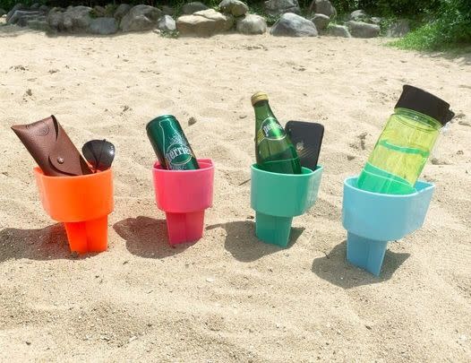 A set of four beach cup holders