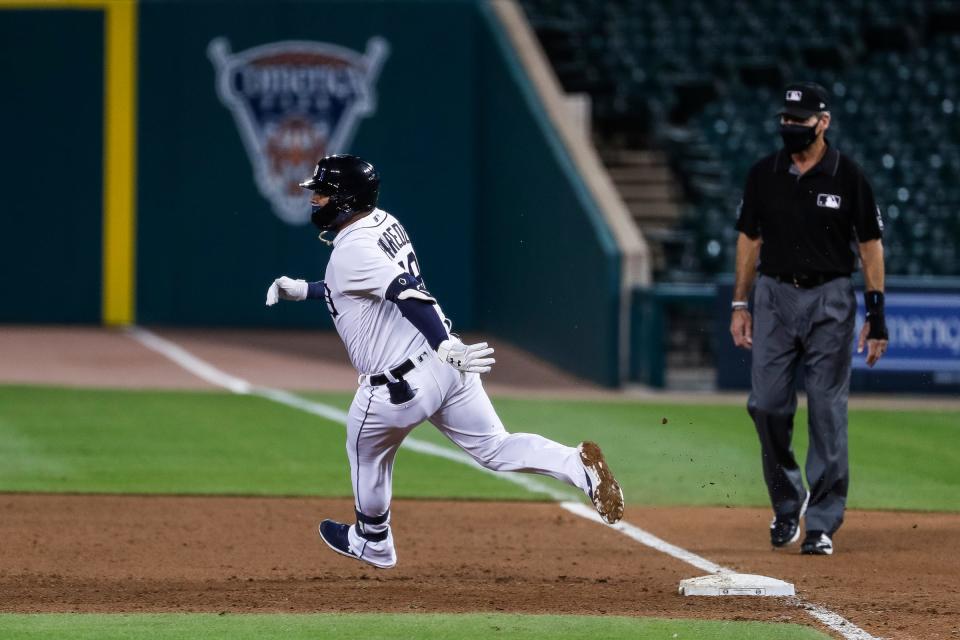 Tigers third baseman Isaac Paredes runs past first base after hitting single against the Cubs during the fourth inning at Comerica Park on Tuesday, Aug. 25, 2020.