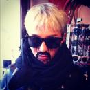 G-Dragon wears a mustache?