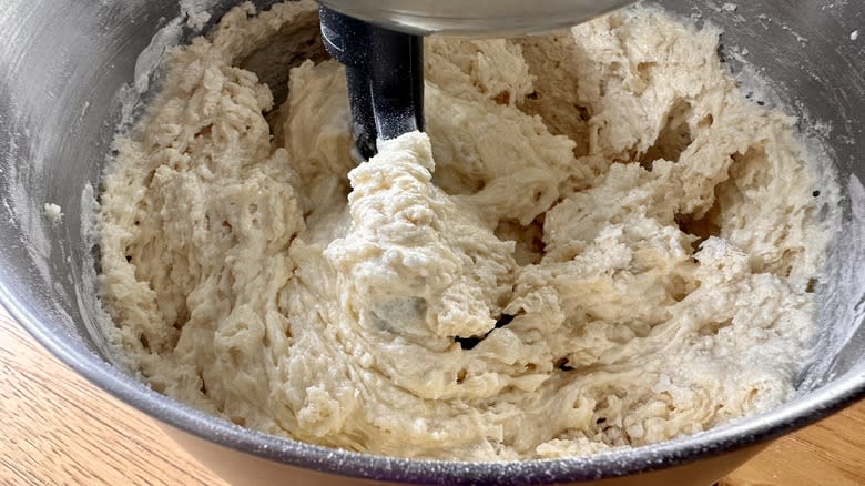mixing flour into creamy mixture