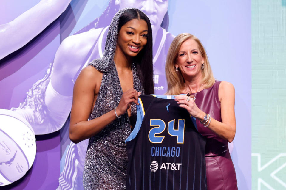 NEW YORK, NEW YORK - APRIL 15: Angel Reese poses with WNBA Commissioner Cathy Engelbert after being selected seventh overall pick by the Chicago Sky during the 2024 WNBA Draft at Brooklyn Academy of Music on April 15, 2024 in New York City. (Photo by Sarah Stier/Getty Images)