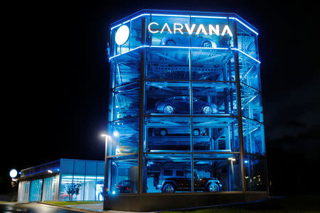 Vehicles are displayed at a Carvana dealership, which allows customers to buy a used car online and have it delivered or pick it up from an automated-tower, in Austin, Texas, U.S., March 9, 2017. REUTERS/Brian Snyder