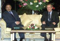 FILE - Then United States Secretary of Defence Donald Rumsfeld, right, smiles as he meets with then President General Pervez Musharraf at the executive residence in Islamabad on Nov. 4, 2001. Gen. Pervez Musharraf, who seized power in a bloodless coup and later led a reluctant Pakistan into aiding the U.S. war in Afghanistan against the Taliban, has died, an official said Sunday, Feb. 5, 2023,. He was 79.(AP photo/Jason Reed, File)