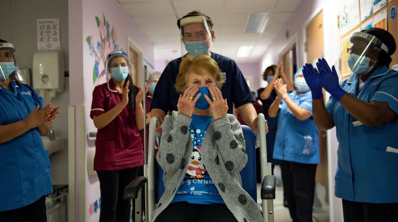 Margaret Keenan, 90, is the first person in Britain to receive the Pfizer/BioNTech COVID-19 vaccine at University Hospital in Coventry