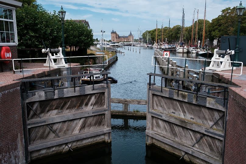 Amsterdam is two metres below sea level, protected by an elaborate system of canals, locks and dams.