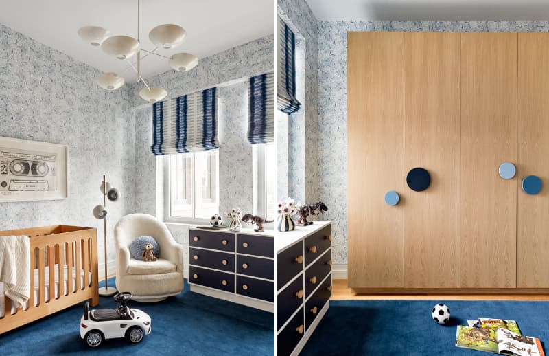 Nursery with blue and white wallpaper, blue rug, and wood, white and blue accents