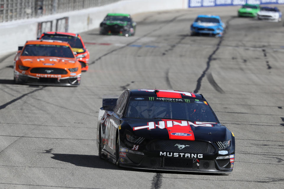 HAMPTON, GA - FEBRUARY 24:  Clint Bowyer, driver of the #14 Haas Automation Ford, leads a pack of cars during the Monster Energy NASCAR Cup Series Folds of Honor QuikTrip 500 at Atlanta Motor Speedway on February 24, 2019 in Hampton, Georgia.  (Photo by Chris Graythen/Getty Images)