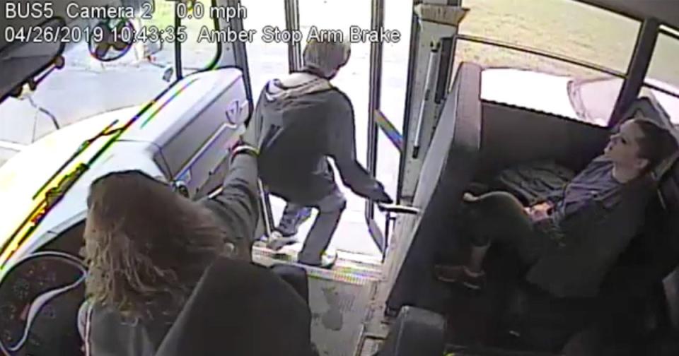 Bus Driver Stops Kid from Stepping in Front of Speeding Car