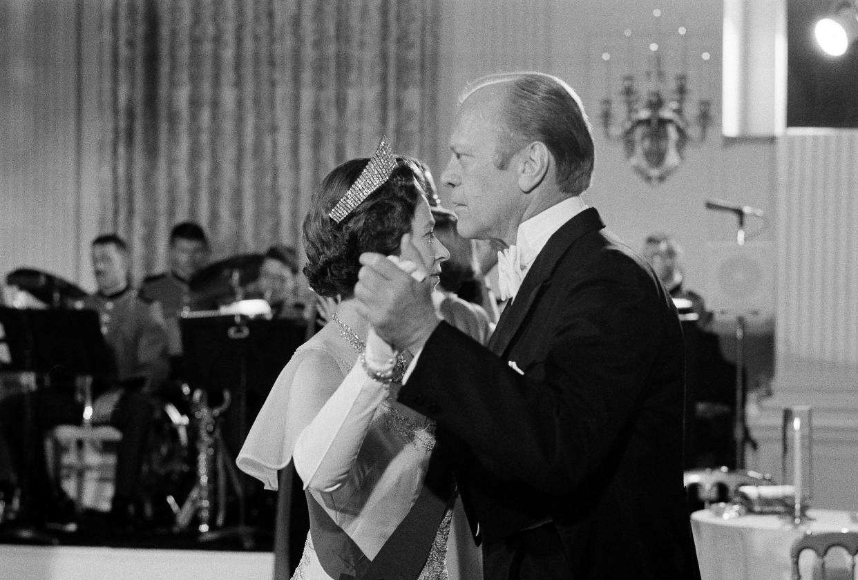 U.S. President Gerald Ford (38th president) dances with Britain's Queen Elizabeth II in the State Dining Room at the White House, following a State Dinner in the queen's honor, on July 7, 1976.