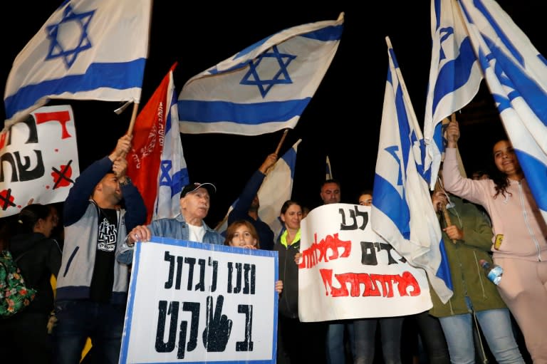 Residents of the southern Israeli city of Ashkelon, who endured barrages of rockets this week, demonstrate on November 14, 2018, against Prime Minister Benjamin Netanyahu and the Gaza ceasefire he ordered