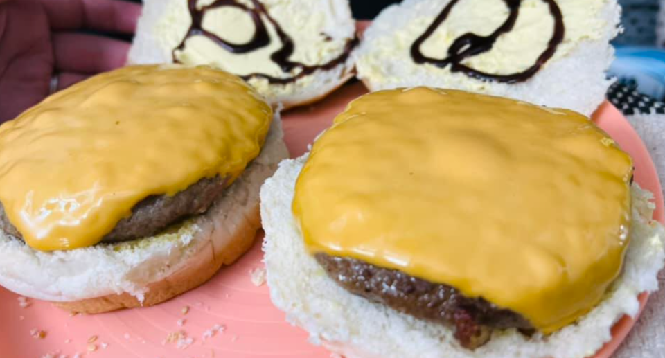 The melted cheese on some home-made burgers.