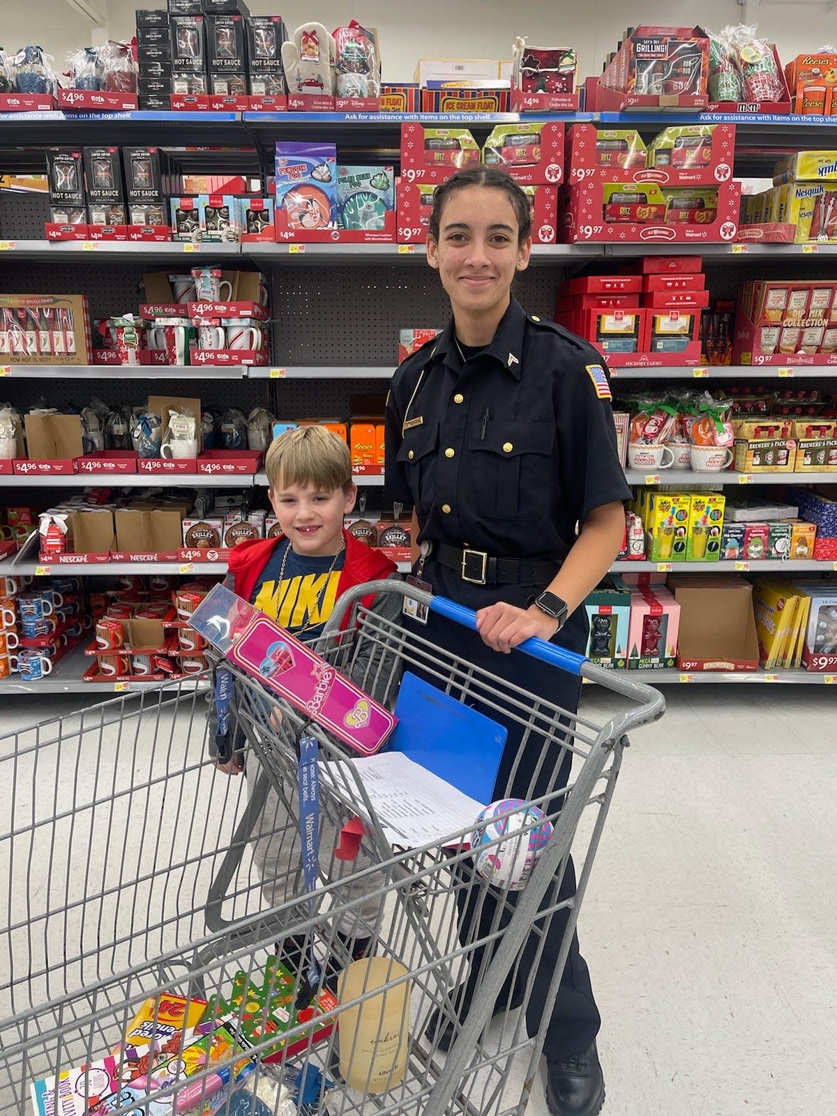 Newark Police Department, community agencies and Newark City Schools teamed up to help 85 kids and their families shop for Christmas gifts at Walmart.