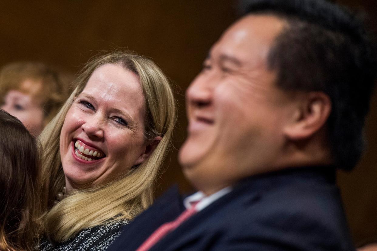 <span>James Ho and his wife Allyson during his Senate judiciary committee confirmation hearing in Washington DC on 15 November 2017.</span><span>Photograph: Tom Williams/CQ-Roll Call via Getty Images</span>