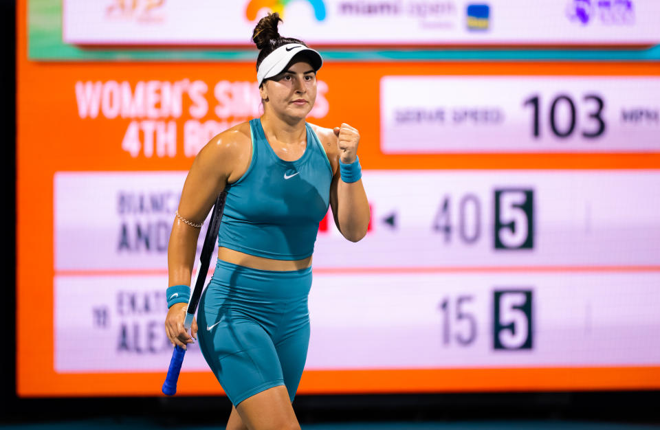 Bianca Andreescu celebrates winning a point.