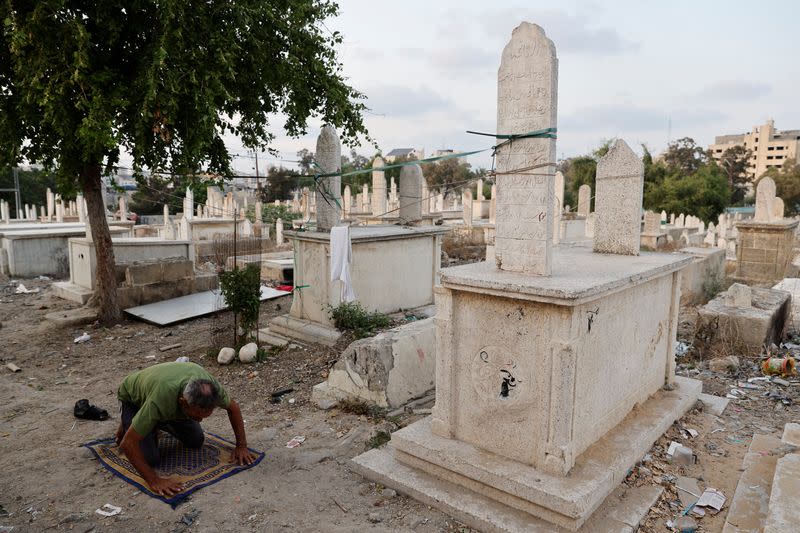 The Wider Image: Gaza struggles to accommodate the living and the dead as population grows