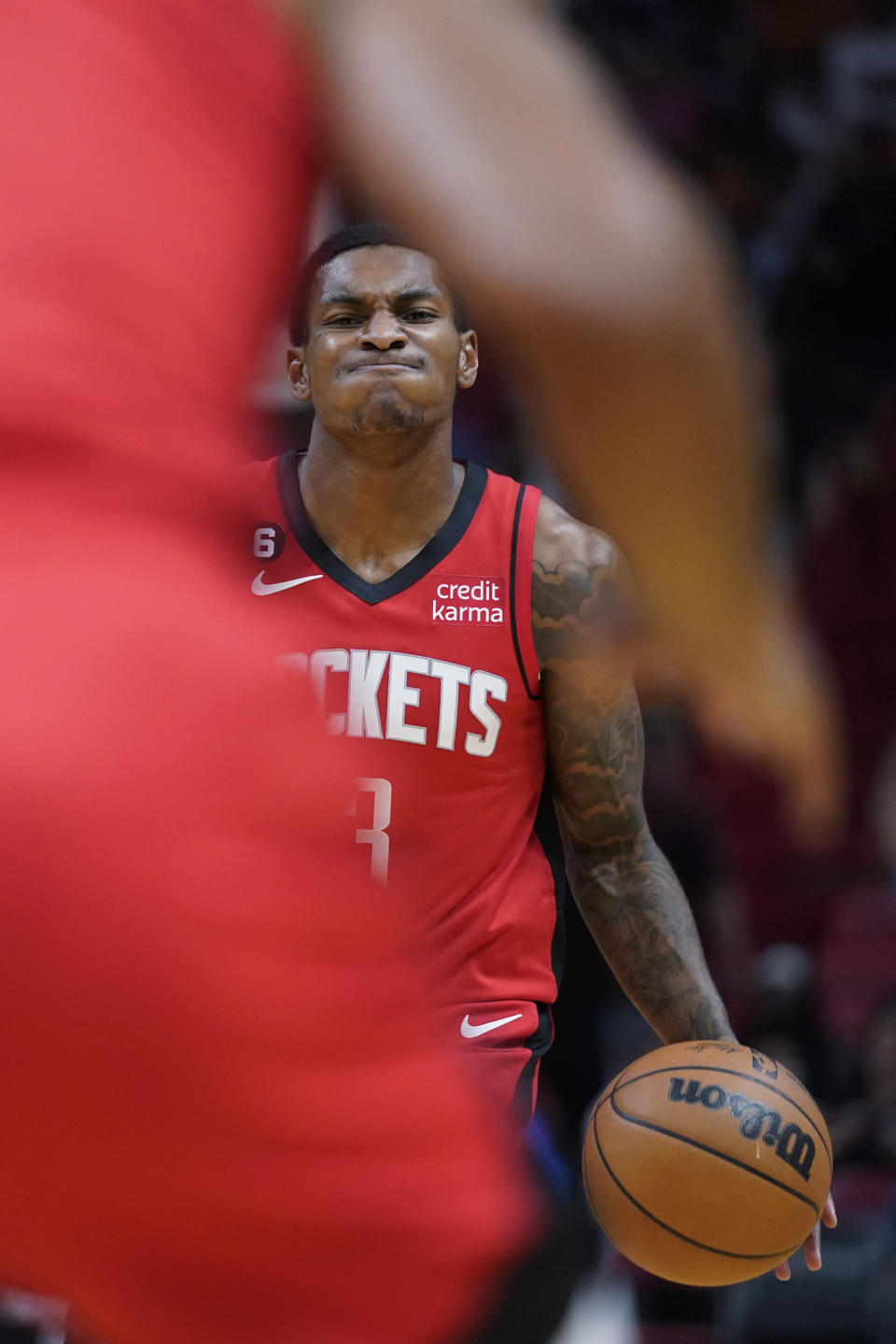 Houston Rockets guard Kevin Porter Jr. looks for an open teammate during the first half of a preseason NBA basketball game against the Miami Heat, Monday, Oct. 10, 2022, in Miami. (AP Photo/Wilfredo Lee)