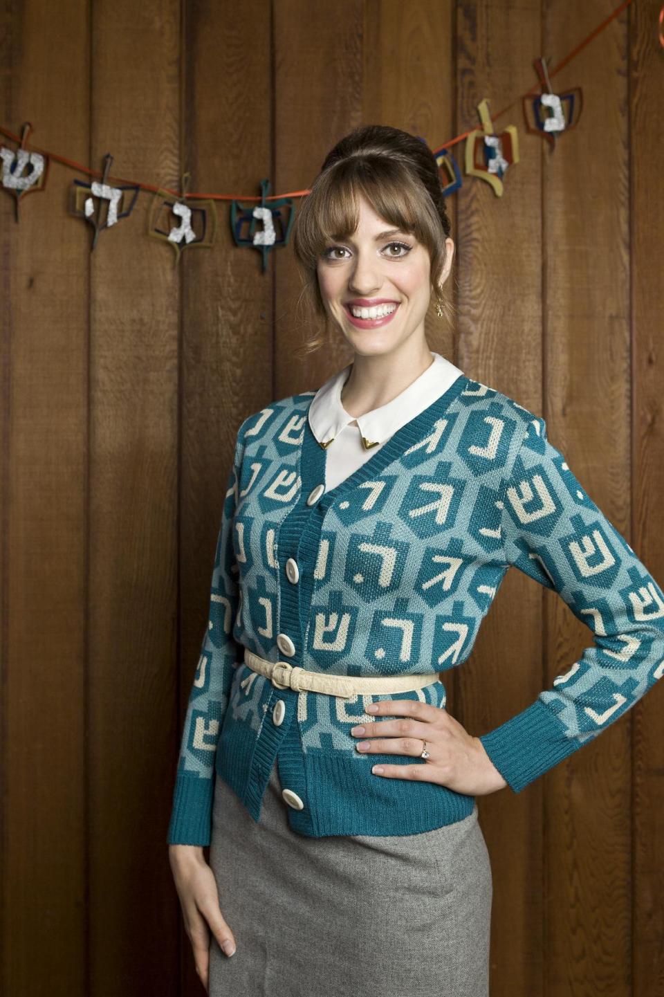 This product image released by GeltFiend.com shows a holiday sweater decorated in a menorah print. (AP Photo/GeltFiend.com)