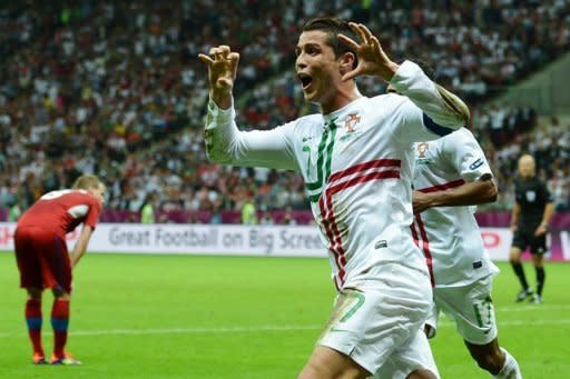 Portuguese forward Cristiano Ronaldo celebrates after scoring a goal during the Euro 2012 football championships quarter-final match the Czech Republic vs Portugal at the National Stadium in Warsaw. Portugal won 1-0