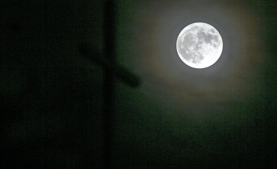 The Sturgeon full moon rises over St. John the Evangelist Catholic Church in Viera Tuesday, August 1, 2023. Craig Bailey/FLORIDA TODAY via USA TODAY NETWORK