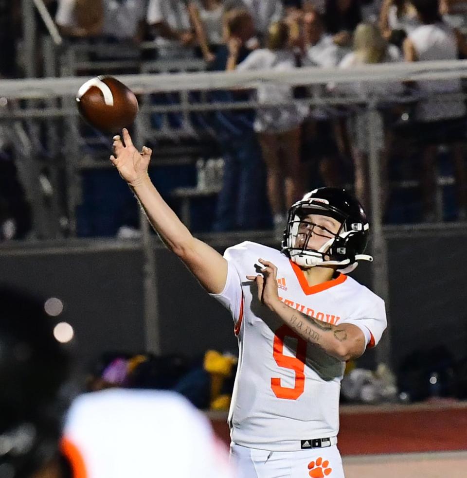 Withrow quarterback Luke Dunn airs out a fade pass to the end zone for a touchdown at Marx Stadium, Aug. 17, 2023.