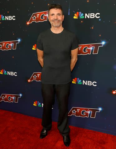 <p>Kevin Winter/Getty</p> Simon Cowell attends the red carpet for "America's Got Talent" season 18 live show in August 2023