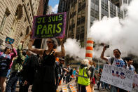 <p>Demonstrators hold up signs as they take part in an anti-Trump “March for Truth” rally on June 3, 2017 in New York City. (Photo: Eduardo Munoz Alvarez/Getty Images) </p>