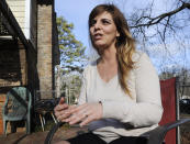<p>Former skinhead Shannon Martinez talks about her time as a white supremacist during an interview at her home in Athens, Ga., Jan. 11, 2017. A member of the racist group starting in her teen years, Martinez quit decades ago and is now worried about a possible rise in extremism in the United States. (Photo: Jay Reeves/AP) </p>